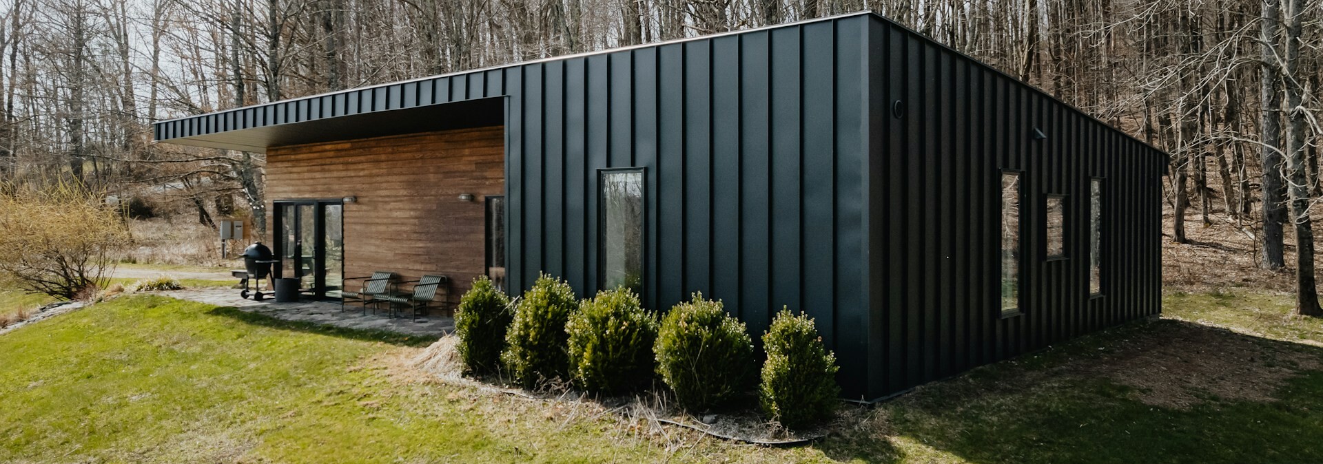 Prefabricated house surrounded by a garden