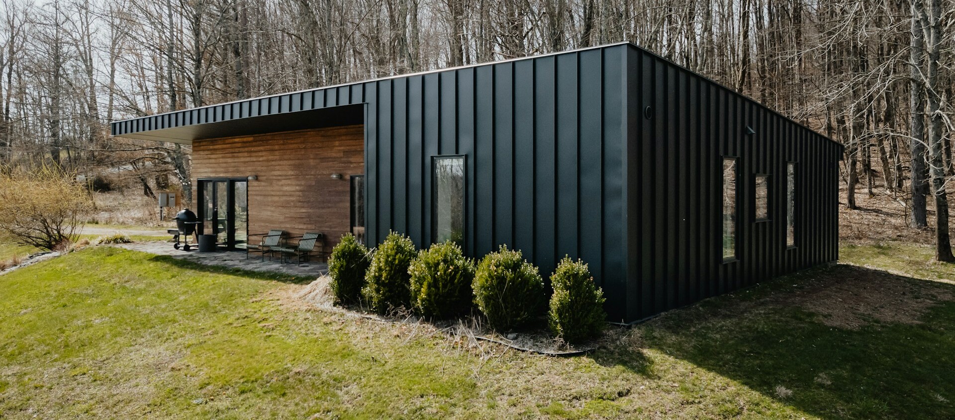 Prefabricated house surrounded by a garden