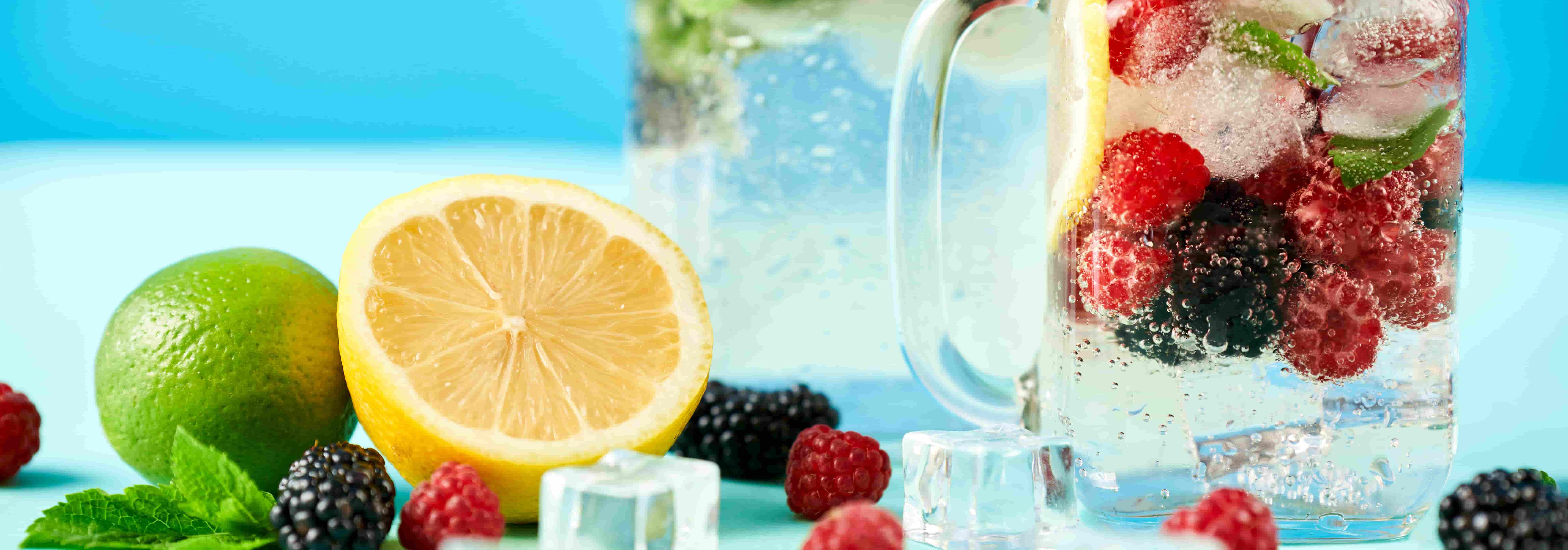 Cool drinks with icecubes, fruits and herbs.